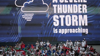 A thunderstorm warning on the big screen in Philadelphia as rain begins during the match between Iraq and France. Imagn Images via Reuters
