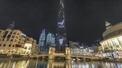 Dubai's Burj Khalifa is lit up in support for Australia. Chris Whiteoak / The National