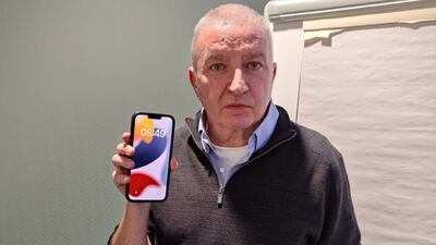 Andy Gibbins tried to use the iPhone his wife bought him for Christmas in the UK and was told it was reported stolen. Photo: Andy Gibbens