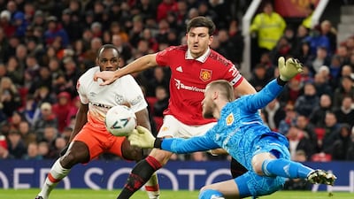 MANCHESTER UNITED RATINGS: David de Gea 7 - Stood up well and closed the angle down to save from Antonio on 23 minutes. Easier save from the excellent Benrahma, then got low to keep out Antonio again. Clawed another West Ham effort away on 50 mins but beaten by a rocket from Benrahma on 54. AP Photo