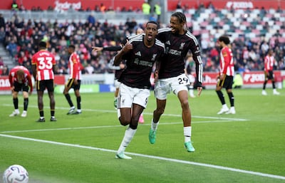Liverpool's Alexander Isak celebrates scoring the second goal with Bradley Barcola. Reuters