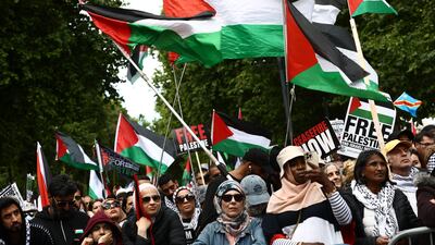 People take part in a pro-Palestine march in central London. PA