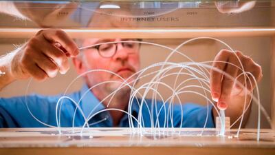 A man prepares the exhibition "For the Greatest Benefit to Humankind" at the Alfred Nobel Museum in Stockholm. The chemistry prize was announced on Wednesday. AFP
