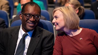 British Prime Minister Liz Truss Chancellor of the Exchequer Kwasi Kwarteng chat at the opening session of Conservative Party Conference in Birmingham last week. Mr Kwarteng was sacked on Friday and Ms Truss is under real pressure to stay in post. EPA