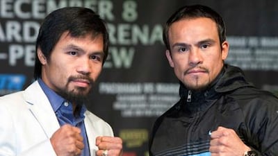 Manny Pacquiao and Juan Manuel Marquez square off ahead of their fight in Las Vegas.