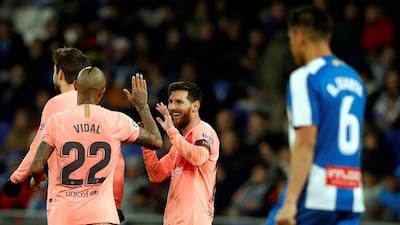 Lionel Messi celebrates after scoring against Espanyol. EPA
