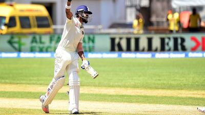 Lokesh Rahul of India celebrates after reaching a century against the West Indies on Day 2 of the second Test on Sunday. Frederic J Brown / AFP / July 31, 2016