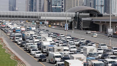 According to the updated traffic rules, which came into force on July 1, motorists are fined Dh400 and receive four black points on their licence if their backseat passengers do not fasten their seatbelts. Pawan Singh / The National