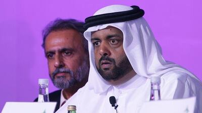Qadhi Saeed al Mrooshid, right, the director general of the Dubai Health Authority, says their aim is to educate and create awareness about breast cancer. At left is Dr Essa Kazim of the health authority in a file picture from 2008.