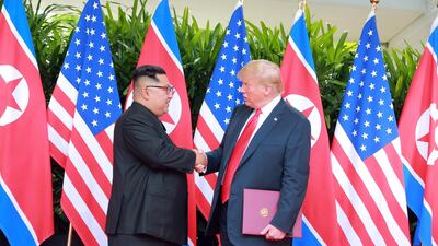 North Korean leader Kim Jong-un and US President Donald Trump met in Singapore last year. KCNA / EPA