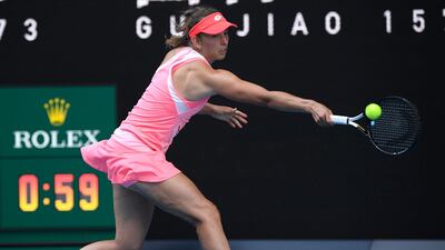 Elise Mertens hits a backhand during her win over Belinda Bencic. AP