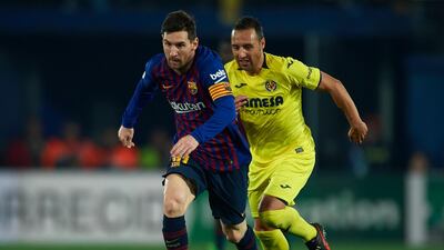 Barcelona's Lionel Messi runs with the ball. Getty Images