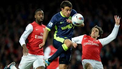 Franco di Santo, centre, scored for Wigan against Arsenal last night.