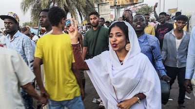 To the refrain of "revolution" shouted by the crowd, the slender Ms Saleh chanted: "They burned us in the name of religion, killed us in the name of religion, jailed us in the name of religion."
