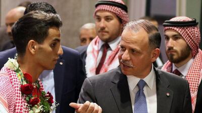 Jordanian Prince Faisal bin Al Hussein, right, with Ahmed Abughaush, left. Khalil Mazraawi / AFP