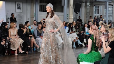 A model on the catwalk for the Atelier Zuhra show at London Fashion Week. Photo: Stephen Coke / Shutterstock