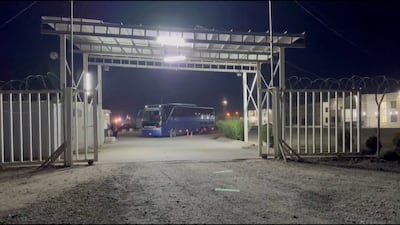 A bus carrying Syrian soldiers on Iraq's side of Al Qaim border, on December 19 last year. Iraq’s main border crossing with Syria is set to reopen next week, signalling improved ties with Damascus. Reuters