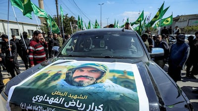 Mourners attend a funeral for members of Iraq's Popular Mobilisation Forces in Baghdad on March 10. AFP