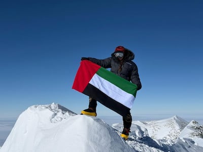 Fatima Al Awadhi raised the UAE flag on top of Lenin Peak. Photo: Wam