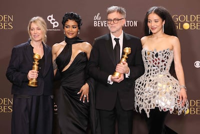 From left: producer Sara Murphy, actress Teyana Taylor, director Paul Thomas Anderson and actress Chase Infiniti with their Best Motion Picture - Musical or Comedy award for One Battle After Another. AFP