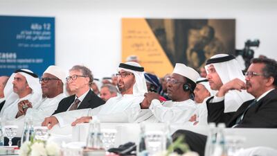 HH Sheikh Hazza bin Zayed Al Nahyan, Vice Chairman of the Abu Dhabi Executive Council (2nd R), HH Sheikh Mohamed bin Zayed (4th R), Bill Gates (5th R), HE Ibrahim Boubacar Keita, President of Mali (6th R), HH Lt General Sheikh Saif bin Zayed Al Nahyan, UAE Minister of Interior (L) and other dignitaries, attend the ‘Countdown to Zero’ exhibition. Mohamed Al Hammadi / Crown Prince Court - Abu Dhabi