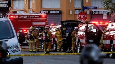 Los Angeles Fire Department firefighters respond to a structure in Los Angeles. AP