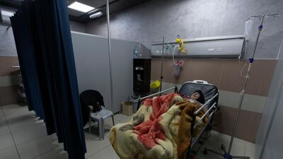 A Palestinian patient infected with Covid-19 lies under medical observation at the emergency unit, in the Palestine Medical Complex, in the West Bank city of Ramallah. AP Photo