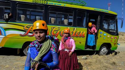 Disembarking from the bus at the base of the mountain.