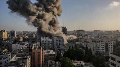 Smoke rises after an Israeli strike. EPA
