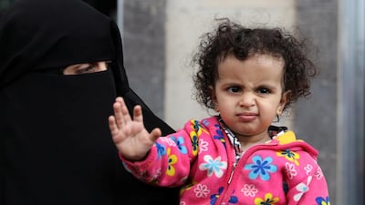 A girl gestures before boarding a United Nations plane which will carry her and other patients to Amman, Jordan in the first flight of a medical air bridge from Sanaa airport in Sanaa, Yemen. Reuters