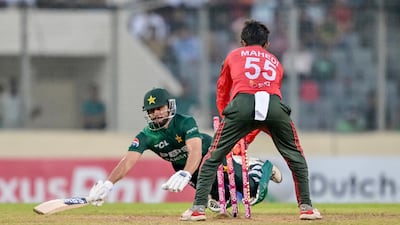 Pakistan's Mohammad Nawaz is run out by Bangladesh's Mahedi Hasan during the first T20 at the Sher-e-Bangla National Cricket Stadium in Mirpur. AFP