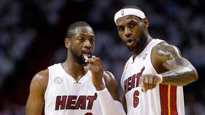 Dwyane Wade, left, and LeBron james form the core of the Miami Heat. Wilfredo Lee / AP Photo