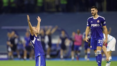 Dinamo Zagreb's Josip Misic celebrates after the match. Reuters