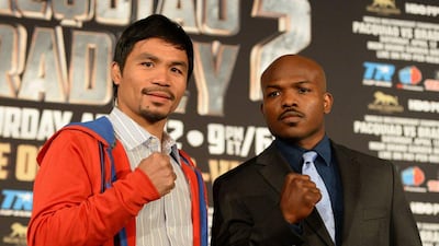 Manny Pacquiao and Timothy Bradley will fight on April 12 in Las Vegas. Joe Klamar / AFP