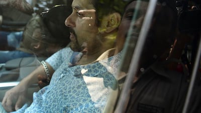 Indian Bollywood film actor Salman Khan leaves in a car after appearing at the sessions court in Mumbai. AFP