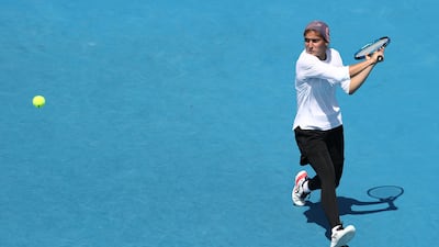 Meshkatolzahra Safi during her junior singles match against Anja Nayar. Getty