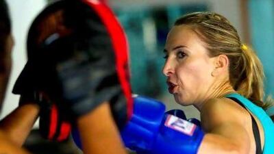 Melanie Swan trains with Nik Taumafai at KO Gym in Dubai's Marina area for her bout at White Collar Fight Night on March 23.