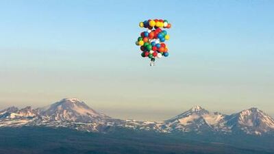 The cluster balloonist Kent Couch is planning another adventure in Iraq. He is pictured soaring past Mount Bachelor in Oregon in 2007.