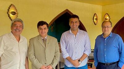 Fakhr-e-Alam with Pakistani Consul General in Dubai Ahmed Amjad (second to left).