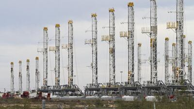 The oil services company Baker Hughes said that US oil rigs in use were up another five in the latest week at 658. Jacob Ford / Odessa American via AP