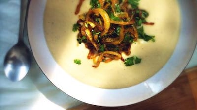 White bean soup with crispy curried onions and bread. Silvia Razgova / The National