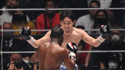 Mayweather is goaded by Mikuru Asakura. AFP