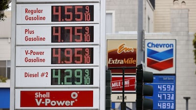 Petrol prices nearing $5 per gallon are displayed at Chevron and Shell stations San Francisco, California. The price of gasoline in the San Francisco Bay Area is the highest in the nation. Big Oil executives are seeking to reward shareholders as commodity prices rise, a turnabout from previous booms when excess cash was poured into costly growth projects. Getty Images / AFP