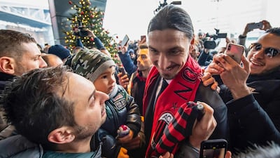 Zlatan Ibrahimovic with Milan supporters. AP