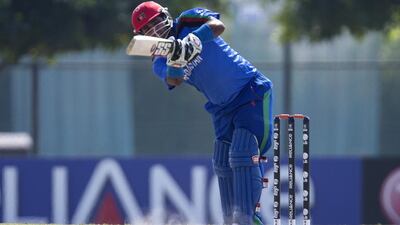 Mohammad Shahzad led Afganistan to victory over Zimbabwe in Sharjah. Christopher Pike / The National