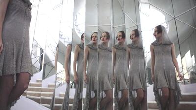 5. The dress is paired with slingback booties in black crêpe de Chine and satin, and is subject to approval by Lagerfeld during a final fitting in the studio, the day before the show. Courtesy Chanel