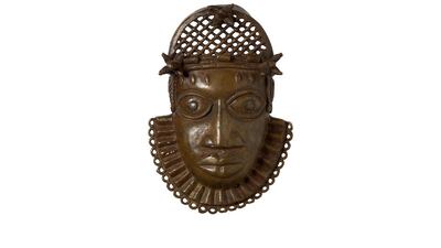 A mask, part of the Benin Bronzes to be returned to Nigeria. PA