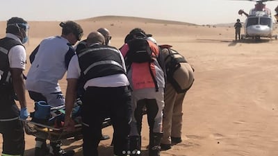 A British man is airlifted to hospital after breaking a leg and his pelvis in a motorcycle accident in the desert of Dubai. Courtesy: National Search and Rescue Centre