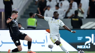 Sadio Mane of Al Nassr shoots while under pressure from Abdullah Azazieh of Al Shabab. Getty Images
