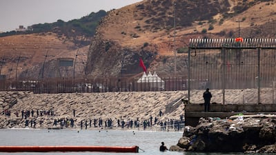 Authorities said about 50,000 people crossed into Ceuta by land and sea from July 30, in an unprecedented surge. Reuters